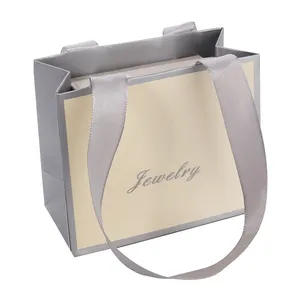Custom Recyclable Material Printing Design Luxurious Silver Paper Gift Paper Bags For Jewelry Wholesale