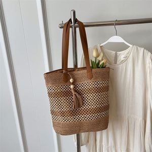 New Fashion Casual Woven Summer Beach Handbag Women Hollow Out Seaside Vacation Straw <b>Tote</b> Bag With Tassels - Product Image 6