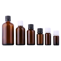 Bouteille en verre pour huile essentielle d'ambre en gros avec bouchon inviolable et insert, conteneur cosmétique 5~100ml personnalisable