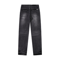 Jeans Slim Homme AMI RI Rock n Roll en Denim avec Effet Usé de Luxe, Coupe Empilée et Patchs Signature