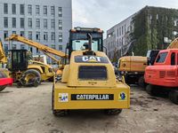 Rouleau compresseur vibrant à tambour unique CAT CS-683E d'occasion, compacteur Caterpillar pour la construction routière