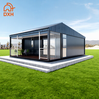 Maison préfabriquée moderne en panneaux sandwich en acier, conteneur plat préfabriqué, appartement 2 chambres avec salle de bain