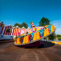 Manège de parc d'attractions extérieur certifié CE, type Flying Turntable, construction en fibre de verre et acier, capacité 24 personnes, garantie 12 mois