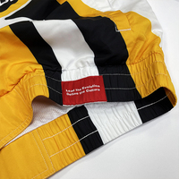 Veste et short brodés avec logo costume Sport Track 1/4 ensemble zippé survêtement personnalisé coupe-vent