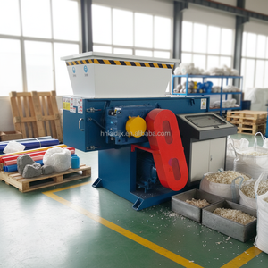 Déchiqueteur automatique mono-axe avec pompe moteur pour tuyaux PE/PP, blocs de plastique et déchets de recyclage, <span class=keywords><strong>poussoir</strong></span> <span class=keywords><strong>hydraulique</strong></span> contrôlé par PLC - Product Image 1