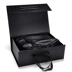 Pequeña venta al por mayor personalizada ISO9001 mango de cinta negra bolsa magnética de cartón rígido plegable caja de embalaje de regalo con forro