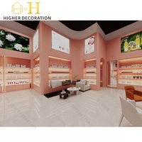 Vitrine de présentation de luxe rose corail pour collection de cosmétiques, meuble de présentation de maquillage