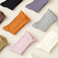 Chaussettes empilées mi-tube en coton confortables pour le printemps et l'automne Chaussettes filetées à bord en bois doux