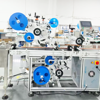 Machine d'étiquetage automatique double face supérieure et inférieure pour boîtes en carton, cartes, sacs en plastique, pochettes en papier, sachets, bocaux carrés et bouteilles