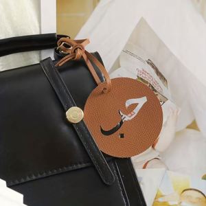 Colgante de Viaje con Alfabeto Árabe Exótico, Etiqueta de Equipaje de Estilo Cultural, Adorno Creativo para Mochila, Accesorio de Recuerdo de Viaje - Product Image 1