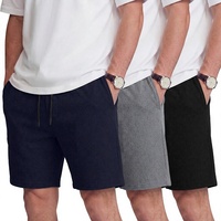 Shorts athlétiques pour hommes en tissu gaufré uni, 7 pouces, extensibles, avec cordon de serrage et taille élastique, vente en gros OEM en vrac