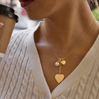 Collier en acier inoxydable 304 pour femmes, couleur or, motif double cœur en relief et perle tombante, bijoux en gros à maillons en O