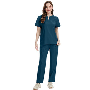 Uniformes médicos 42336 para mujer y hombre, conjunto de blusa y pantalón con bolsillos, uniforme de trabajo unisex. - Product Image 1