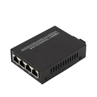 Convertisseur de média fibre optique monomode 10/100/1000 Mbps 4RJ45 + 10/100/1000 Mbps 1SC 20 km CE/FCC pour CCTV et applications industrielles