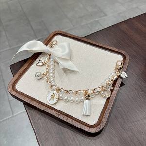 Breloque de <span class=keywords><strong>sac</strong></span> nœud perlé, chaîne double rang de luxe avec nœud en satin et breloques, accessoire de mode - Product Image 4