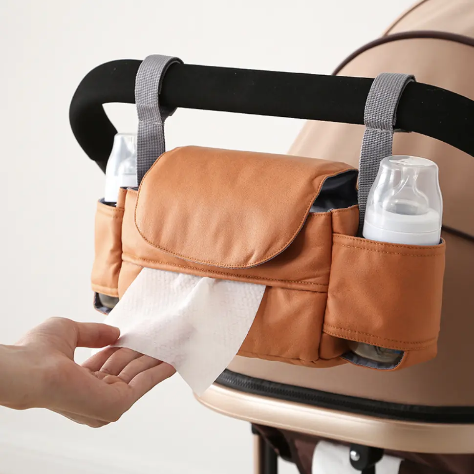 Nuevo organizador de cochecito impermeable sólido de PU, pañal, bolsa para madre, gancho de maternidad multifunción, botella colgante para cochecito de bebé