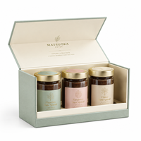 Boîte cadeau de luxe personnalisée imprimée, style livre, à trois compartiments, avec couvercle à charnière et séparateur en carton, pour l'emballage de confitures de fruits.