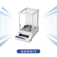 Balance analytique semi-micro SCITEK 0,00001g avec capteur de force électromagnétique, affichage température/tempo, et fonction de suivi automatique de zéro