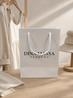 Sacs en papier blanc en gros avec logo personnalisé, sacs en papier d'emballage pour boutique de vêtements