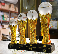 Coupe de football en gros Pujiang avec base en cristal noir ou texte personnalisé pour événements sportifs de football