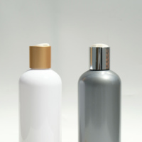 Bouteille de shampooing en plastique ronde Cosmo vide de 300 ml, bouteille d'emballage pour le lavage et le nettoyage avec bouchon à pression doré, couvercle supérieur en aluminium