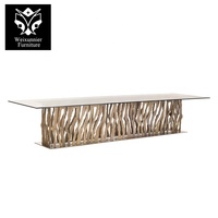 Table à manger élégante de luxe 6 places avec dessus en marbre et socle évidé en acier inoxydable meubles de salle à manger