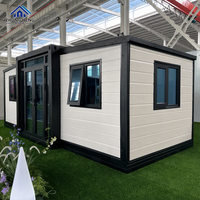 Porte pliante en verre à cadre en acier à motif de briques en bois personnalisé, maison conteneur modulaire préfabriquée à double aile extensible