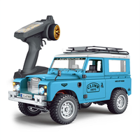 1/10 Maßstab 4WD RC Offroad-Rennwagen 2,4G Ferngesteuertes Klassisches Kletterauto mit Dachträger Allrad-Truck USB-Kabel