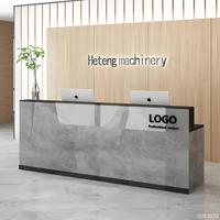 Bureau d'accueil moderne de luxe haut de gamme en aggloméré peint avec façade miroir