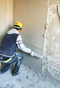 Construction immobilier décor à la maison Machine pulvérisation plâtrage gypse pour plafond briques en béton bloc surfaces murales en ciment