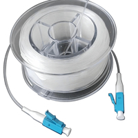 Câble à fibre optique invisible 1000M G657A2 LC UPC avec gaine transparente en PVC/Nylon, bobine de câblage pour FTTH/FTTX, longueur pour câblage intérieur