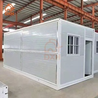 Conteneur de stockage extérieur préfabriqué de 20 pieds en structure acier pour usage résidentiel et professionnel, avec options de conception de salle de bain
