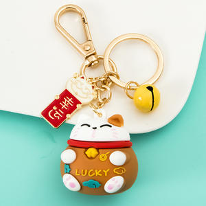 2025 créatif 3D joyeux bagage clé suspendu décoration Couple Anti perte cadeaux en gros Silicone richesse chat cloche porte-clés - Product Image 5