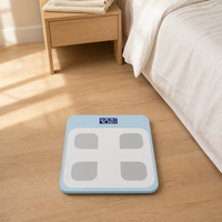 Balance connectée Bluetooth intelligente avec écran LCD en verre trempé bleu clair et affichage de la température pour un pesage corporel précis à domicile