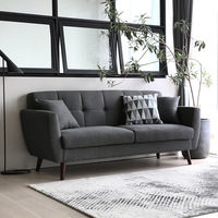 Fauteuil et canapé rembourrés en tissu gris foncé avec pieds en bois massif de style nordique pour appartement et espace de détente - Vente en gros de meubles de maison