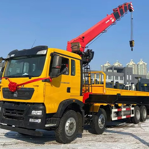 La grúa montada en vehículo Howo T5G 6*4 utiliza un equipo pesado ST260 de 280 caballos de fuerza para transportar los componentes del motor central - Product Image 1