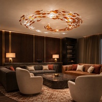 Lustre de plafond rond en verre soufflé sur mesure, luminaire suspendu LED en forme de feuille pour l'éclairage des projets d'hôtels, de halls, de mosquées et de palais