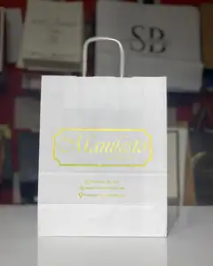 Logo stampato personalizzato bolsas de papel Kraft marrone abbigliamento imballaggio gioielli carta portante grazie sacchetti regalo festa di nozze
