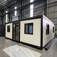 Villa préfabriquée de luxe à 2 chambres, extensible, en conteneur, toit plat, avec construction en panneaux sandwich en acier