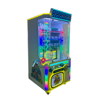 Distributeur automatique à jetons de boule chanceuse de jeu d'arcade d'amusement