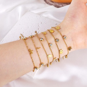กำไลข้อมือสแตนเลสสตีลผู้หญิงสไตล์มินิมอลขายส่ง ชุบทอง 18K ประดับเพชรซิร์โคเนีย ดีไซน์เก๋ สามารถสวมซ้อนกันได้ เป็นชุด - Product Image 1