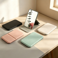 Miroir de maquillage rectangulaire pliable de style pochette, finition argentée, cadre en cuir PU, support réglable, couleurs pastel, vente en gros