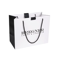 Sac en papier kraft recyclable exclusif pour les boutiques de vêtements, emballage cadeau personnalisé élégant de haute qualité avec logo personnalisé RDY