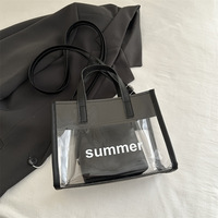 Sac à bandoulière grande capacité en PVC pour femme, avec lettres décoratives, fermeture éclair étanche, idéal pour les loisirs, les voyages et le shopping