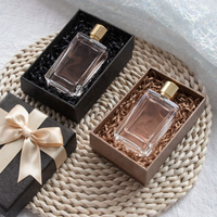 Boîte cadeau magnétique de luxe pour cosmétiques et parfums en papier, avec ruban et logo en feuille d'or et d'argent estampé en sérigraphie