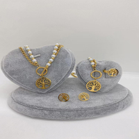 Plaqué or 18 carats collier en os de serpent boucle fleur pendentif collier boucles d'oreilles bracelet bague en acier inoxydable ensemble de bijoux pour femmes