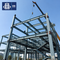 Entrepôt préfabriqué en acier avec panneaux en acier de couleur personnalisée, fabricant de bâtiments d'usine et d'ateliers à structure portique à Chongqing