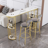 Ensemble table et chaises de bar de salon haut de gamme, style moderne et simple, avec plateau en pierre, idéal pour les petits repas en famille