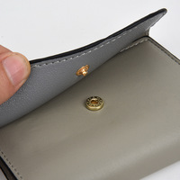 Dompet PU Wanita Gaya Korea Baru Warna Solid Pendek Minimalis Mewah Berpinggiran Minyak Anti RFID Multi-Fungsi