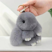 Pendentif Lapin en Peluche Doux et Mignon de 15 cm avec Pompon en Fausse Fourrure pour Voiture, Sac ou Porte-clés